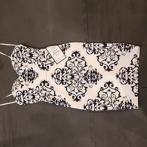 Brand new.B. Darling black and white sleeves and strapless fitted dress